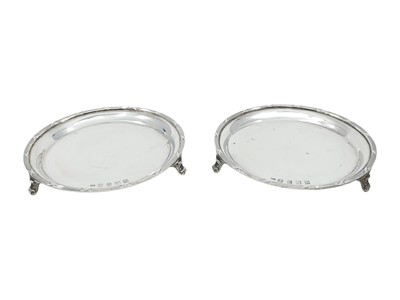 Lot 543 - A PAIR OF IRISH CIRCULAR SILVER STERLING...