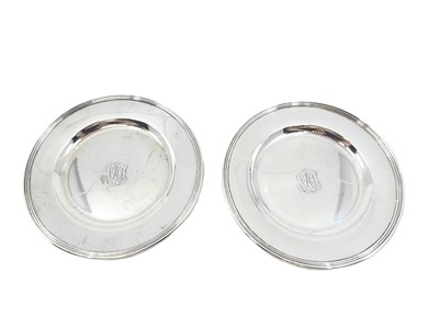 Lot 545 - A PAIR OF MID-20TH-CENTURY USA CIRCULAR SILVER...