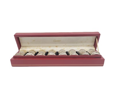 Lot 549 - A CASED "CARTIER" STERLING SILVER (.925)...