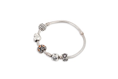 Lot 53 - A SILVER .925 PANDORA CHARM BRACELET, together...