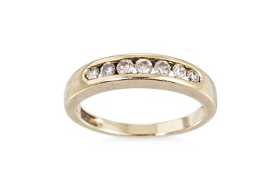 Lot 180 - A DIAMOND HALF HOOP ETERNITY RING, the seven...