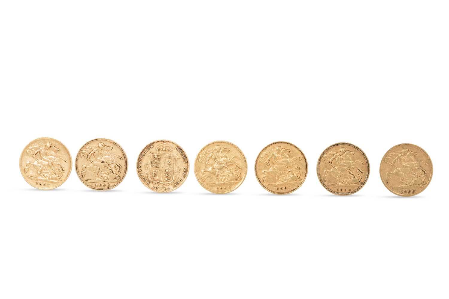 Lot 498 - SEVEN VICTORIAN 22CT GOLD ENGLISH HALF...