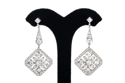 Lot 83 - A PAIR OF DIAMOND  DROP EARRINGS, the round...
