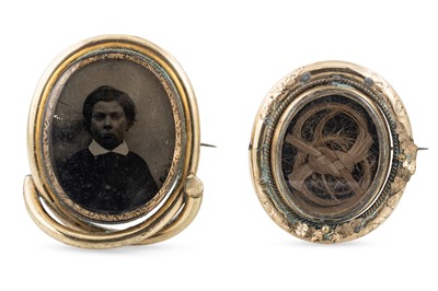 Lot 153 - TWO VICTORIAN MOURNING BROOCHES, one depicting...