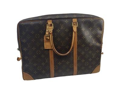 Lot 557 - A LOUIS VUITTON MONOGRAM 'PORT DOCUMENT VOYAGE'...