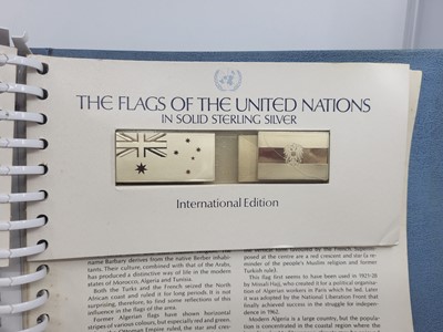 Lot 541 - A BOUND COLLECTION OF FORTY-FOUR "FLAGS OF THE...