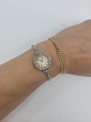 Lot 459 - AN EARLY 20TH CENTURY DIAMOND SET WRIST WATCH,...