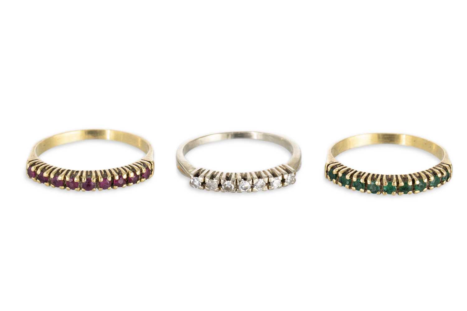 Lot 86 - THREE GEM SET STACKABLE RINGS, one set with...
