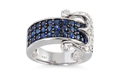 Lot 87 - A SAPPHIRE AND DIAMOND BUCKLE STYLE RING, the...