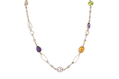 Lot 63 - A DIAMOND AND MULTI GEM SET NECKLACE, set with...