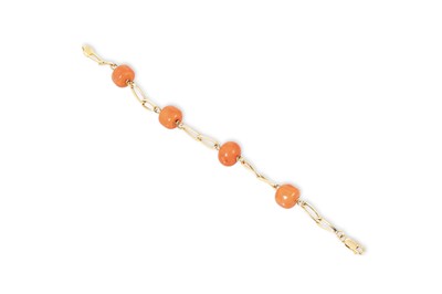 Lot 65 - A BEADED CORAL AND YELLOW GOLD BRACELET, the...