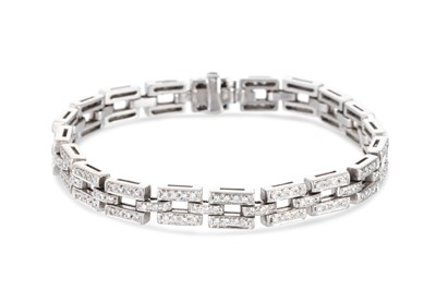 Lot 66 - A DIAMOND BRICK LINK BRACELET, the round cut...