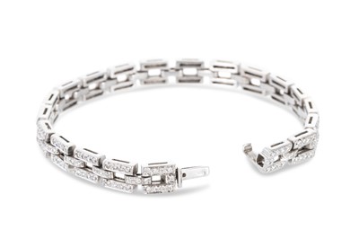 Lot 66 - A DIAMOND BRICK LINK BRACELET, the round cut...