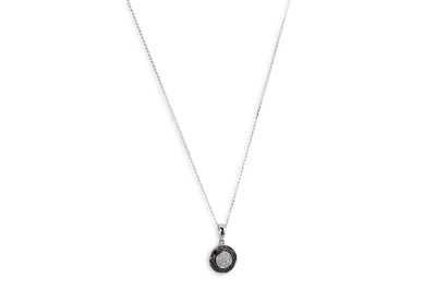 Lot 234 - A BLACK AND WHITE DIAMOND CLUSTER PENDANT,...