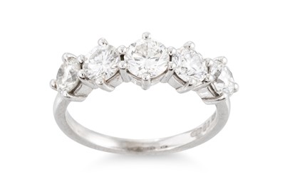 Lot 420 - A FIVE STONE DIAMOND RING, the brilliant cut...
