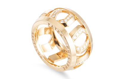 Lot 263 - A PATEK PHILIPPE DIAMOND SET NAUTILUS RING, of...