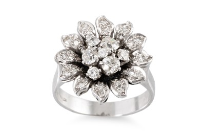 Lot 329 - A VINTAGE DIAMOND CLUSTER RING, of floral form,...
