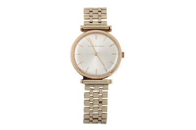 Lot 428 - A VINTAGE GIRARD PERREGAUX GOLD MECHANICAL...