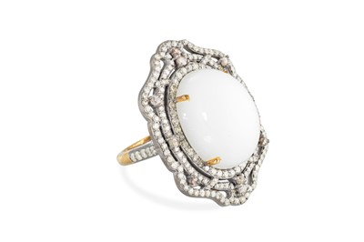 Lot 165 - A DIAMOND AND MOONSTONE RING, mounted in...