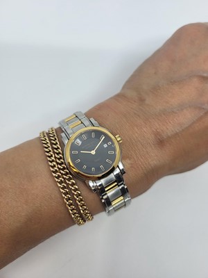 Lot 445 - A LADY'S RAYMOND WEIL 'SAXO' WRIST WATCH,...