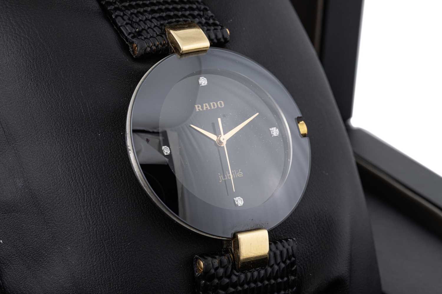 Lot 446 - A RADO 'JUBILIÉ' WRIST WATCH, black dial with...