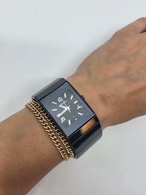 Lot 447 - A GENT'S RADO CERAMIC WRIST WATCH, black dial...
