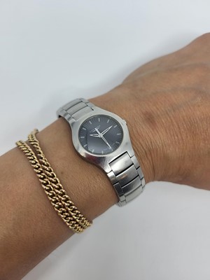 Lot 452 - A LADY'S LONGINES WRIST WATCH, grey dial with...