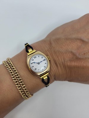 Lot 454 - A LADY'S VINTAGE 9CT WRIST WATCH, Arabic...