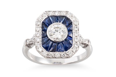 Lot 219 - AN ART DECO STYLE DIAMOND AND SAPPHIRE RING,...