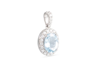 Lot 225 - AN AQUAMARINE AND DIAMOND PENDANT, the oval...