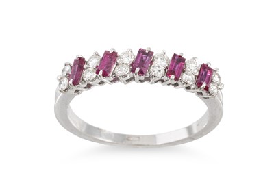 Lot 286 - A RUBY AND DIAMOND HALF ETERNITY RING, mounted...