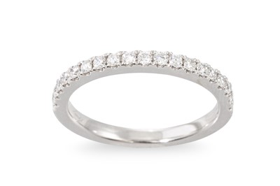 Lot 290 - A DIAMOND HALF ETERNITY RING, mounted in...