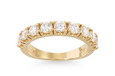 Lot 299 - A DIAMOND HALF ETERNITY RING, the brilliant...