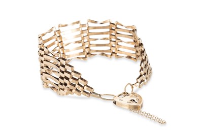 Lot 23 - A 9CT GOLD GATE BRACELET, with padlock clasp,...