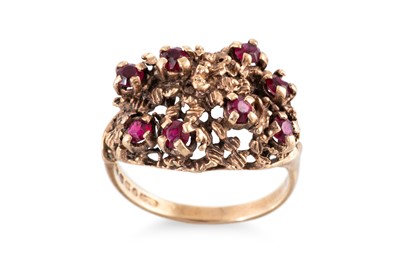 Lot 24 - A 9CT GOLD DRESS RING, stone set and rustic...
