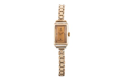Lot 248 - A VINTAGE 9CT GOLD CASED WRIST WATCH, rolled...