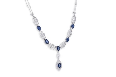 Lot 183 - A SAPPHIRE AND DIAMOND NECKLACE, the oval...