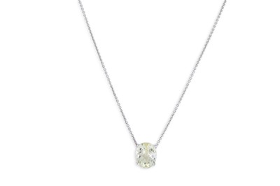 Lot 188 - A TOPAZ PENDANT, oval mixed cut, mounted in...