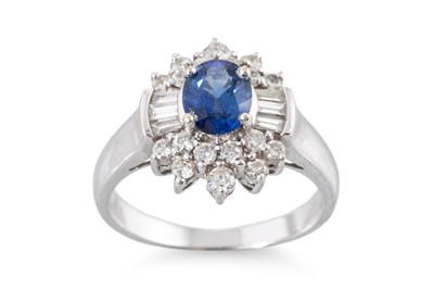 Lot 42 - A SAPPHIRE AND DIAMOND CLUSTER RING, the oval...