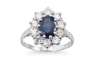 Lot 67 - A SAPPHIRE AND DIAMOND CLUSTER RING, the...