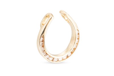 Lot 86 - A DIAMOND SET HORSE SHOE PENDANT, mounted in...