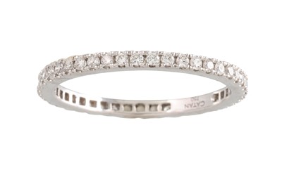 Lot 411 - A DIAMOND ETERNITY RING, the brilliant cut...