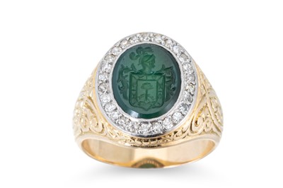 Lot 231 - A DIAMOND AND HARDSTONE SIGNET RING, the...