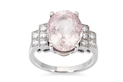 Lot 262 - A MORGANITE AND DIAMOND RING, the oval...