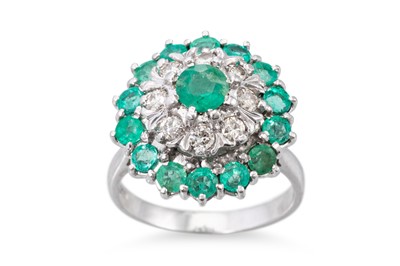 Lot 263 - AN EMERALD AND DIAMOND CLUSTER RING, mounted...