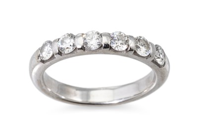 Lot 264 - A SIX STONE DIAMOND RING, the brilliant cut...