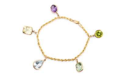 Lot 109 - AN AQUAMARINE, PERIDOT, AMETHYST AND QUARTZ...