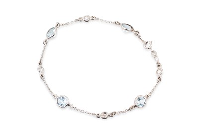 Lot 112 - AN AQUAMARINE AND DIAMOND BRACELET, the...