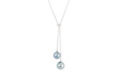 Lot 206 - A PEARL AND DIAMOND NECKLACE, of lariat style,...