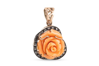Lot 242 - A CORAL PENDANT, the carved coral piece...